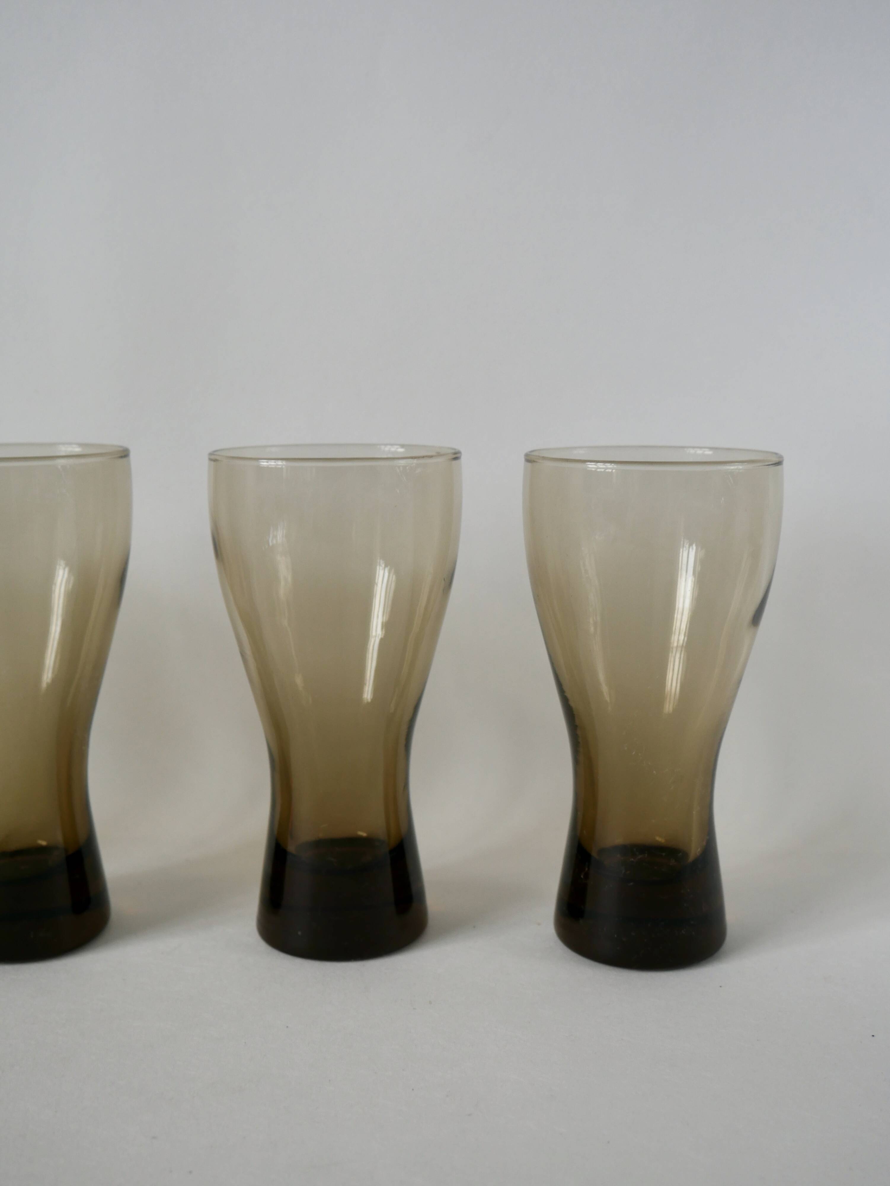 Set of 4 glasses in smoked glass and thick bottom from the 70s