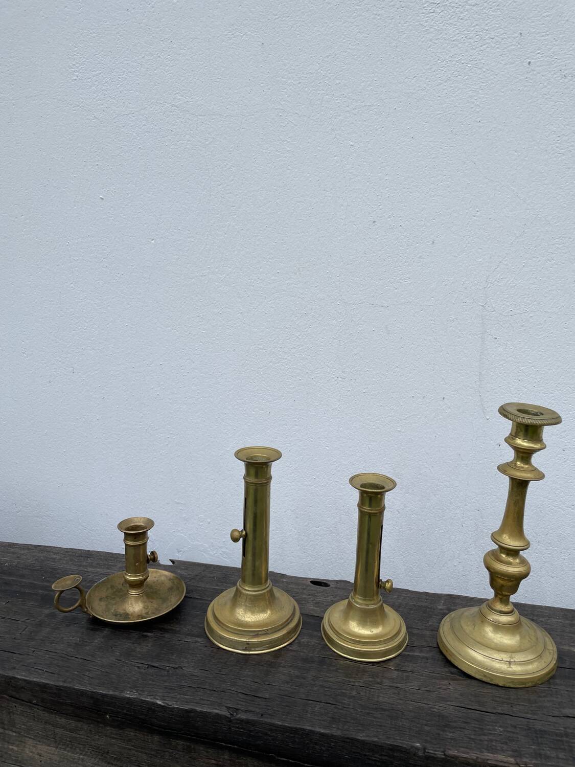 Set of gold-plated brass candlesticks