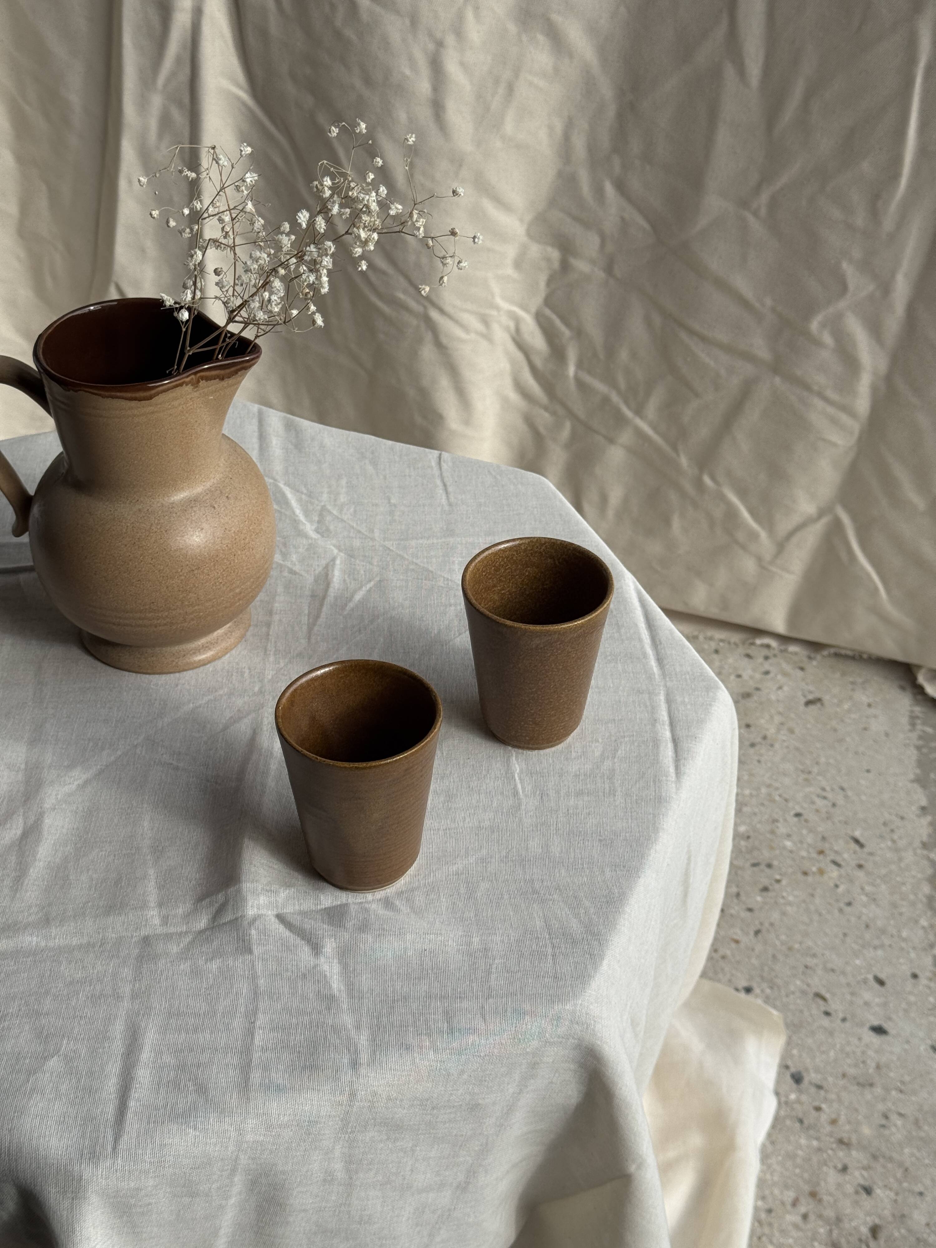 Set of 10 small stoneware mugs from Digoin.