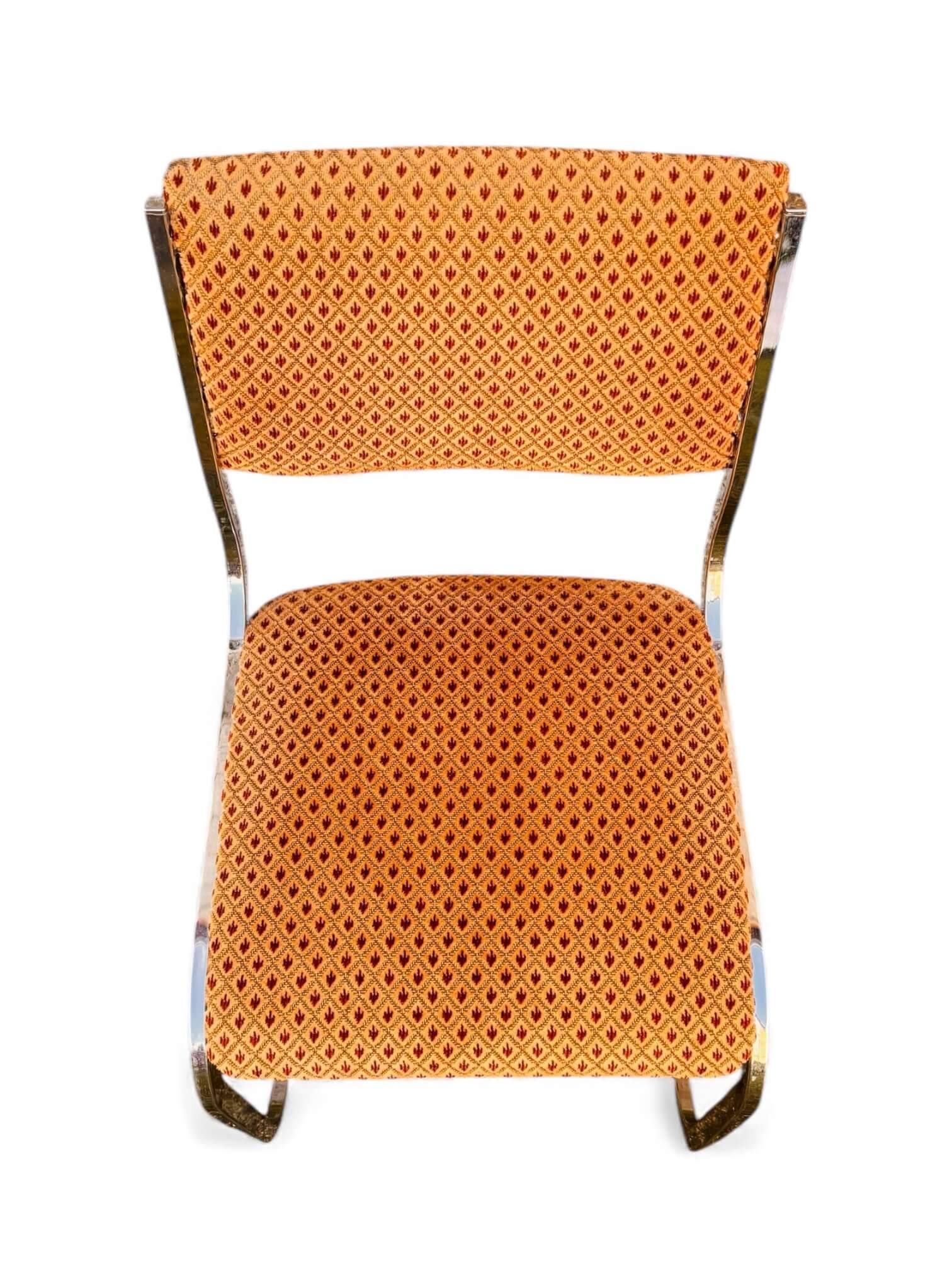 Set of 4 vintage sled chairs from the 1970s