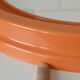 Orange vintage round wall plastic mirror 1980s, space age vanity mirror