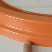 Orange vintage round wall plastic mirror 1980s, space age vanity mirror