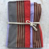 Silver metal covers in their pouch