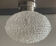 Vintage ceiling light made of intertwined Plexiglas wires.
