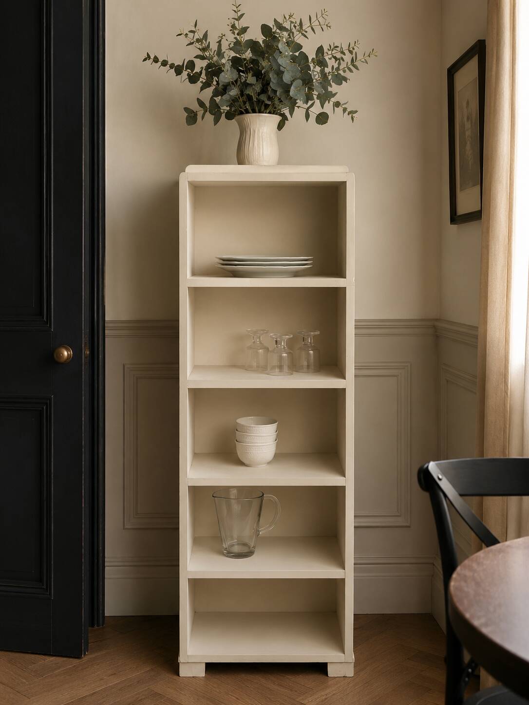 Renovated vintage 1950s library in beige.