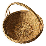 Round wicker basket with rigid handle