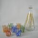 Colorful designer set composed of 7 liqueur glasses and a seventies 70s carafe