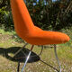Fauteuil vintage orange et pied chromé