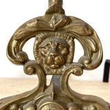 Paire de chenets en laiton , tête de lion