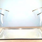 Large serving platter with lid, in silver metal.