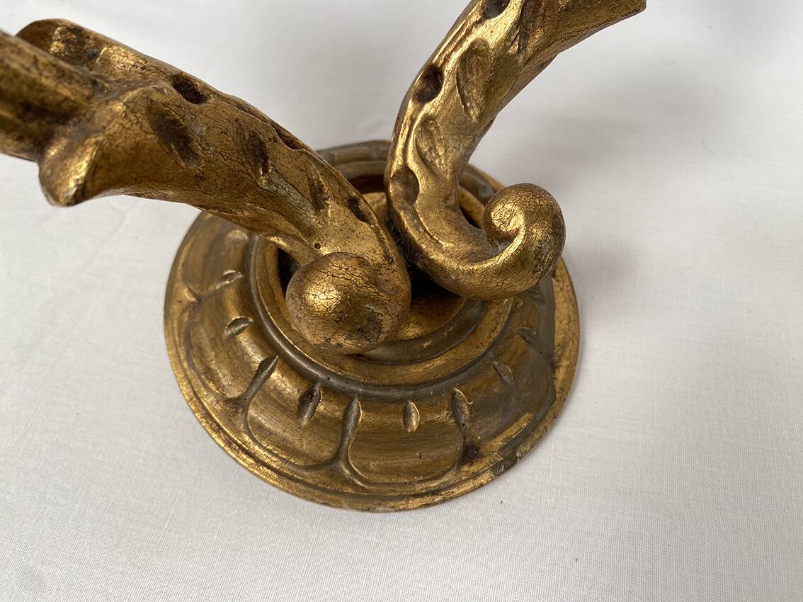 Pair of gilded wooden wall lights with two arms, early 20th century.