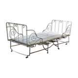 Folding wrought iron bed