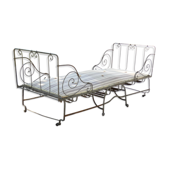 Folding wrought iron bed