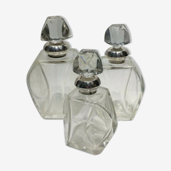 Lot of 3 silver-mounted crystal bottles