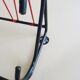 Minimalist wall coat rack in string design in black and red