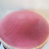 Black stool sitting in velvet rose