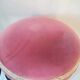 Black stool sitting in velvet rose