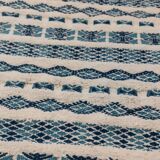 Traditional handmade white and blue carpet