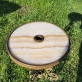 Round table in marble and gilded bronze