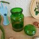Apothecary green glass jar with gilding -vintage