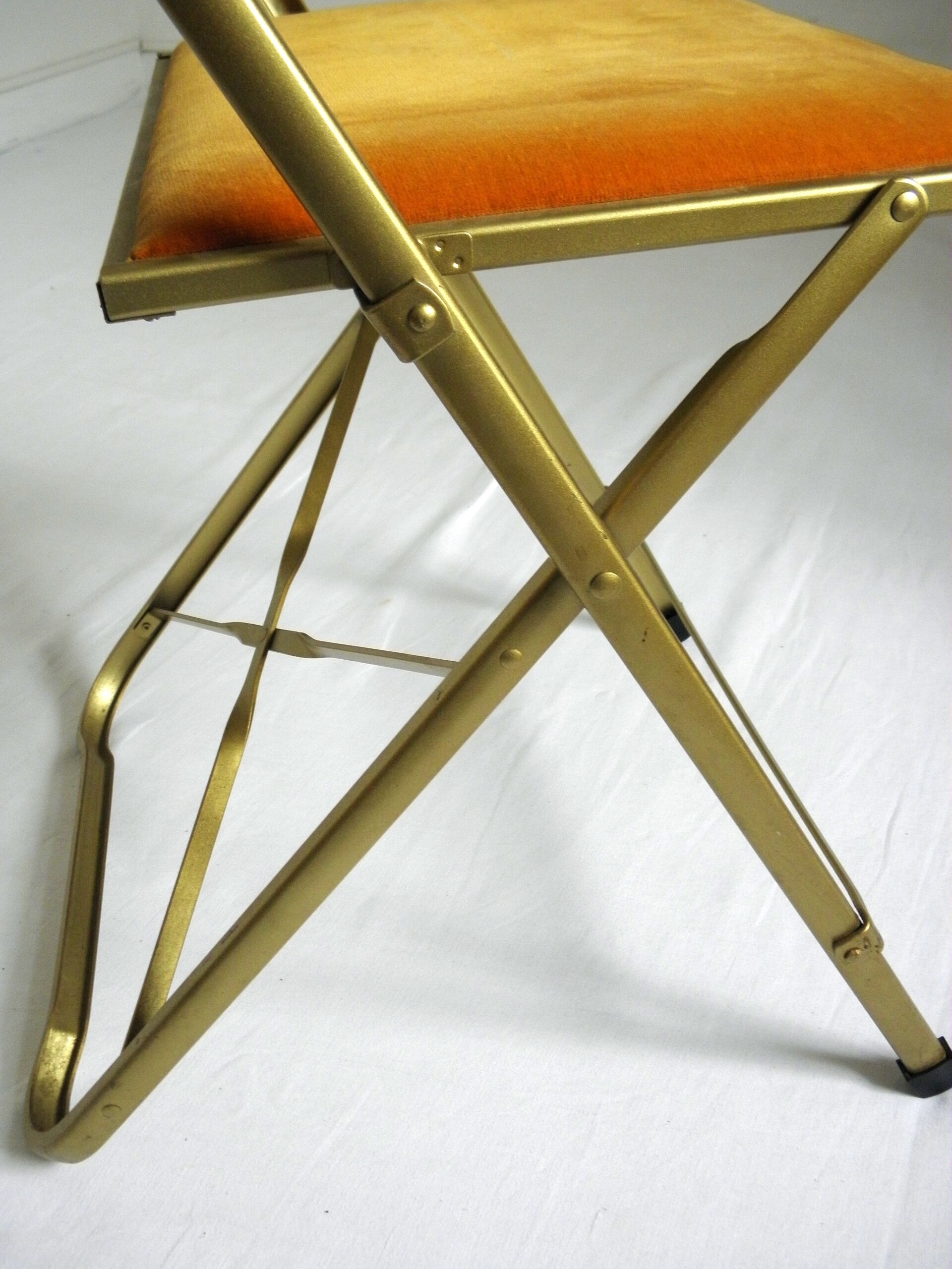 Folding chairs in gold metal and velvet