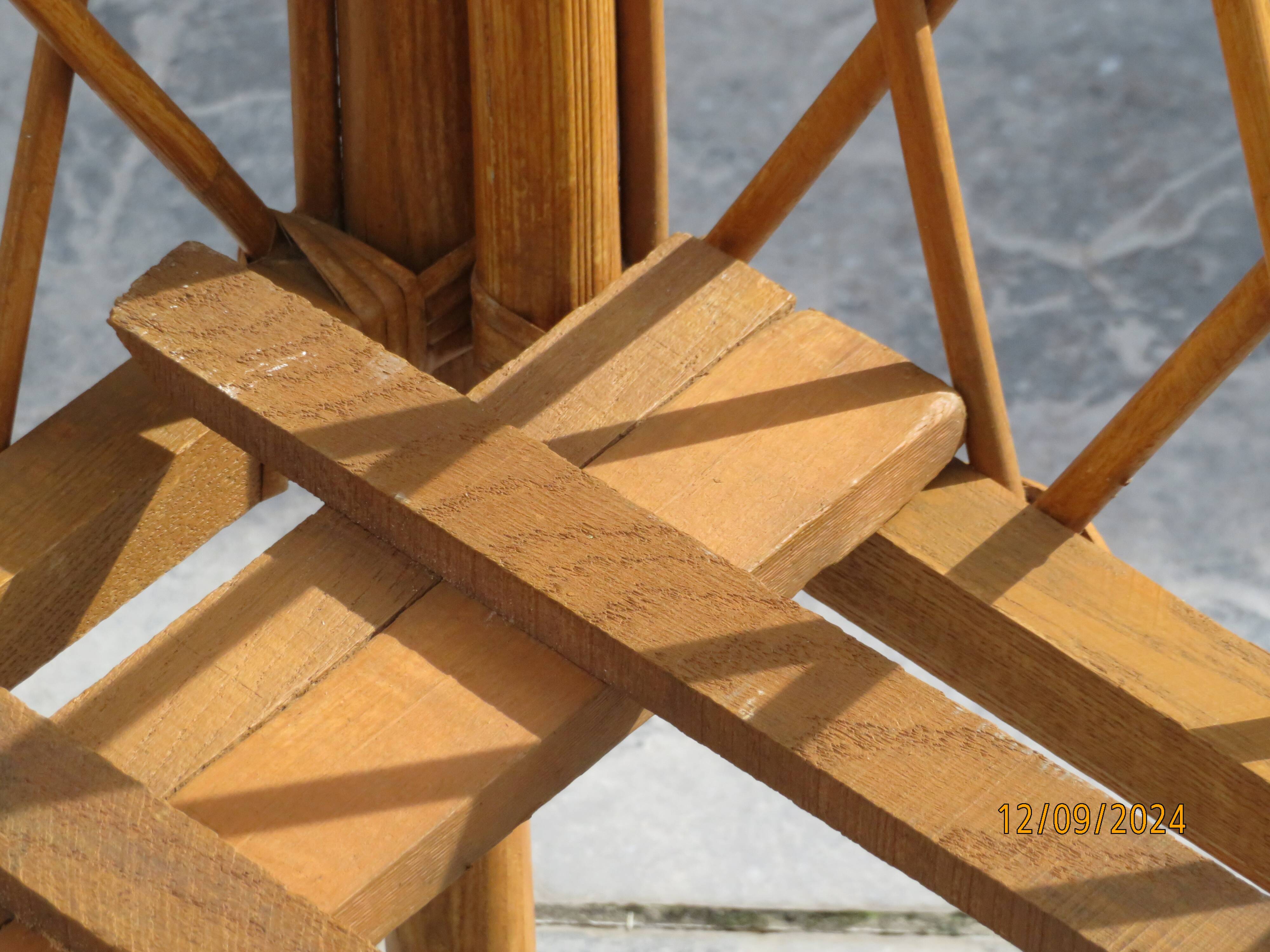 antique rattan children's bed with arrow
