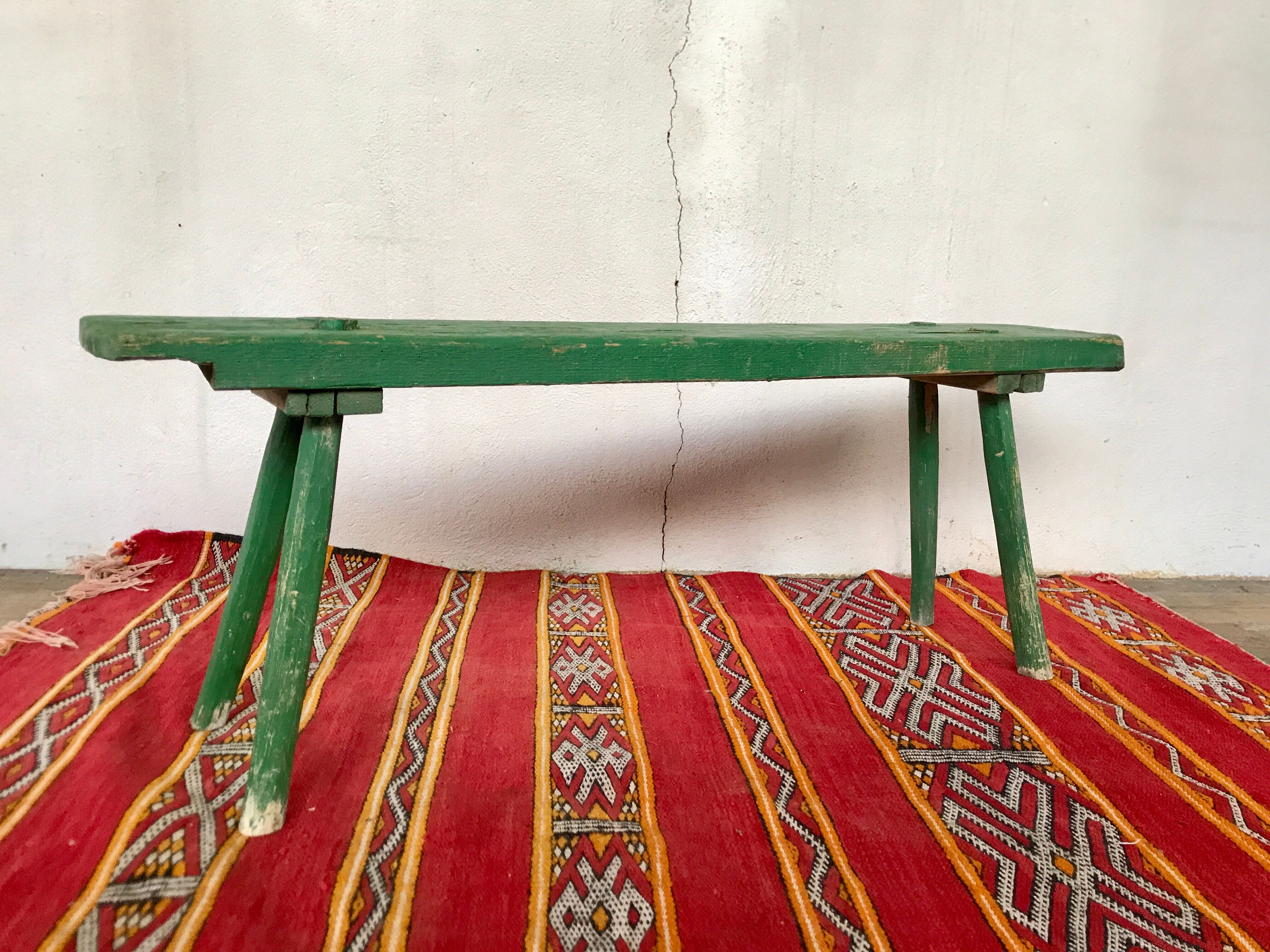 Old vintage bench in green patina fir