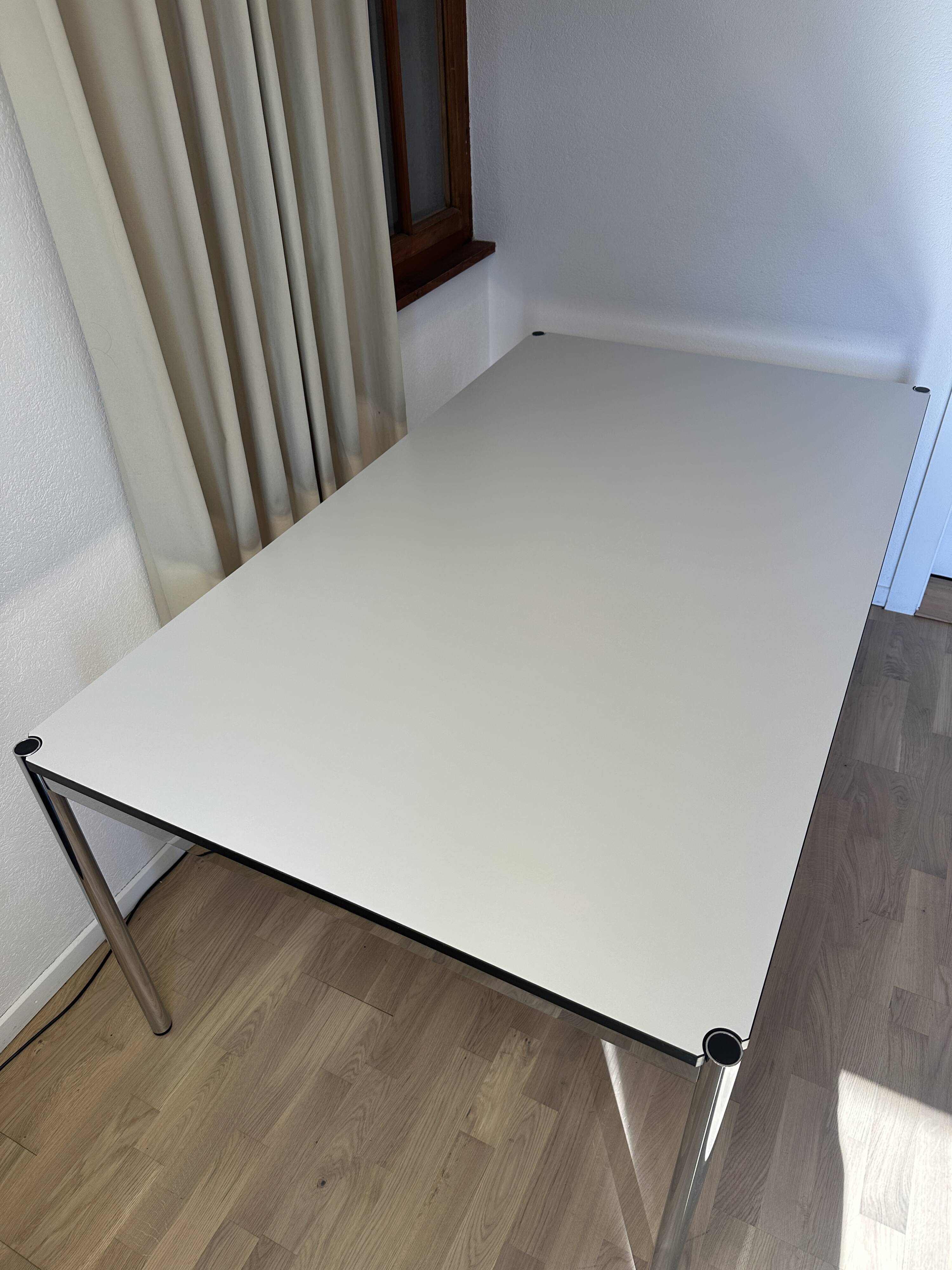 USM Haller desk in pearl grey laminate