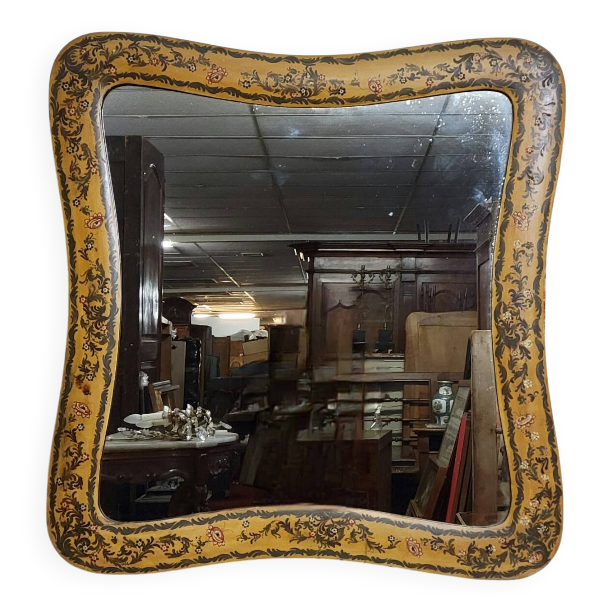 Important rectangular Venetian mirror with a richly painted wooden frame.