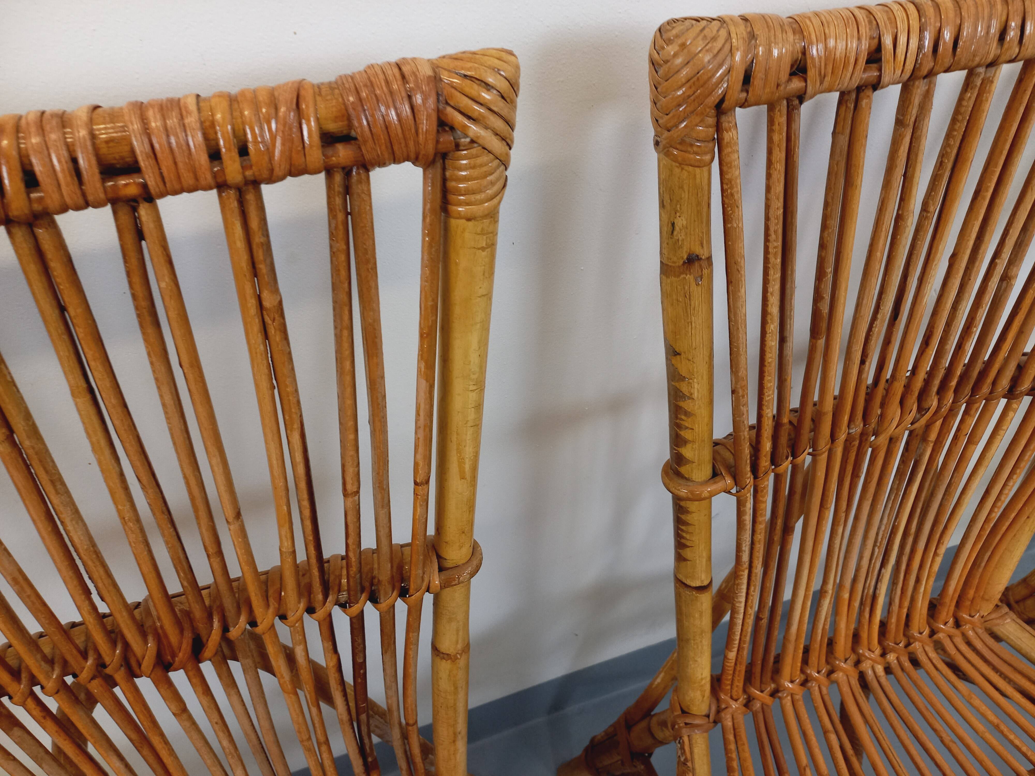 Set of 4 vintage Audoux Minet rattan chairs from the 1950s and 60s.