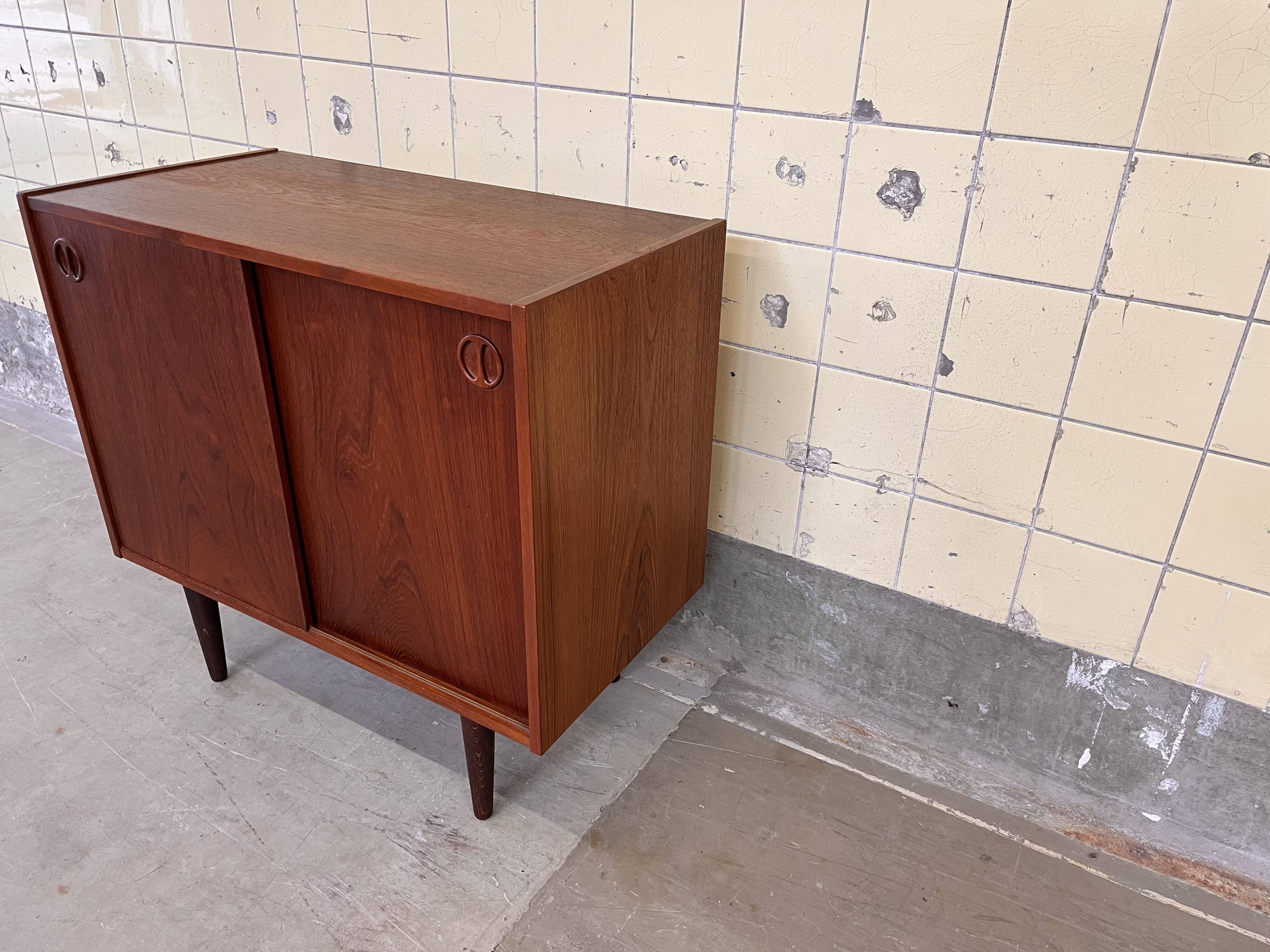 Vintage Danish cabinet with sliding doors