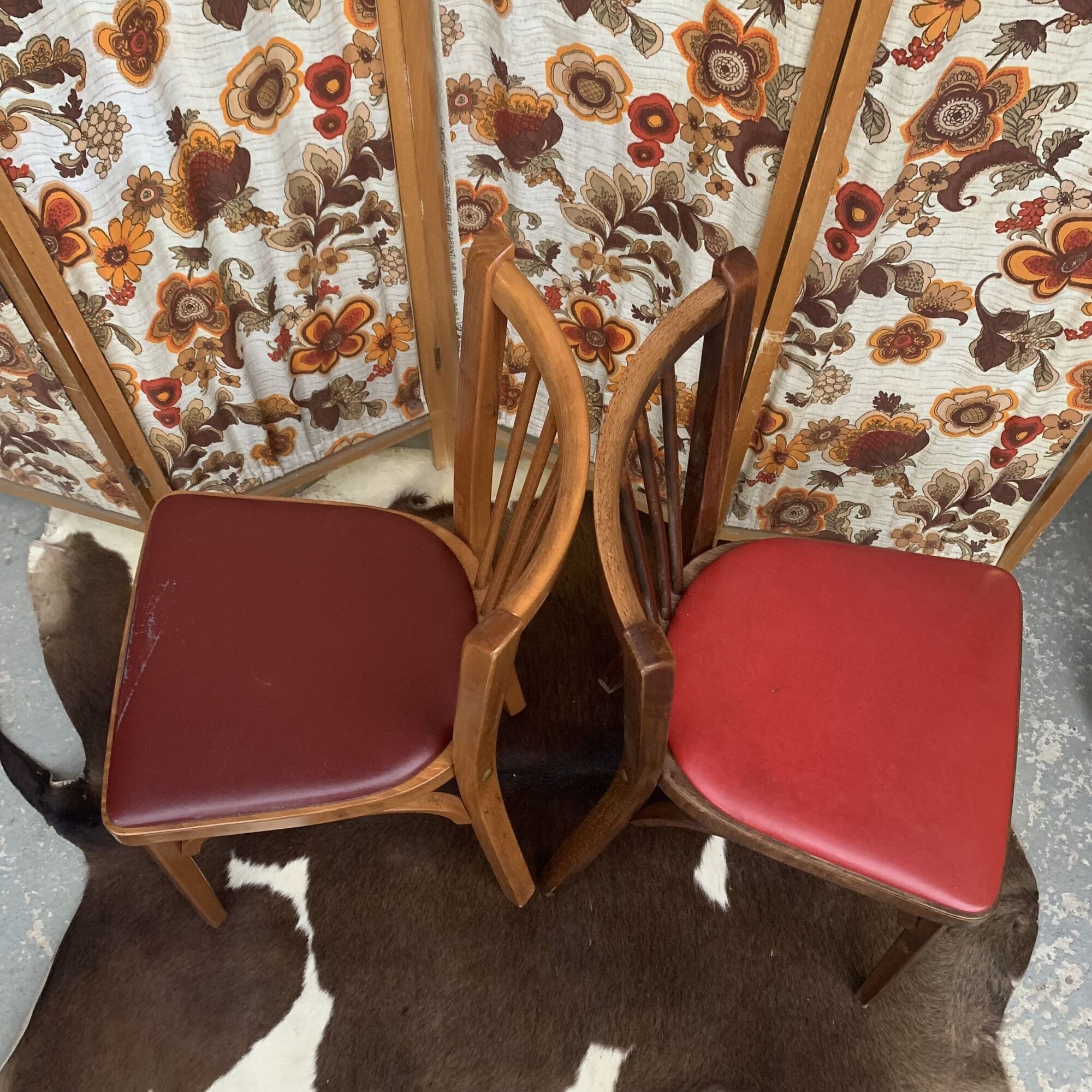 2 baumann bistro chairs sitting skai 1 red and 1 burgundy