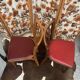 2 baumann bistro chairs sitting skai 1 red and 1 burgundy