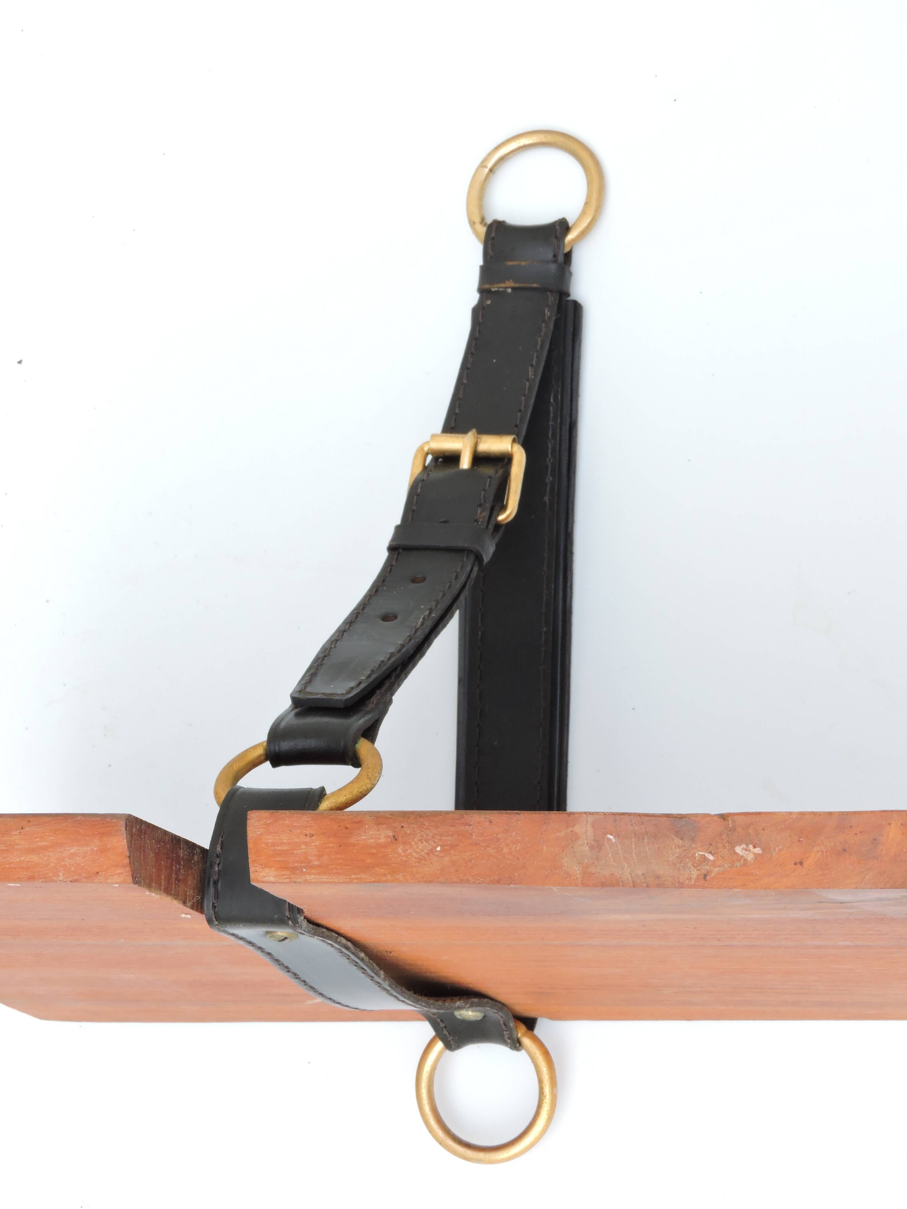 Elm and leather shelf, distributed by the Maison et Jardin Gallery in the 60