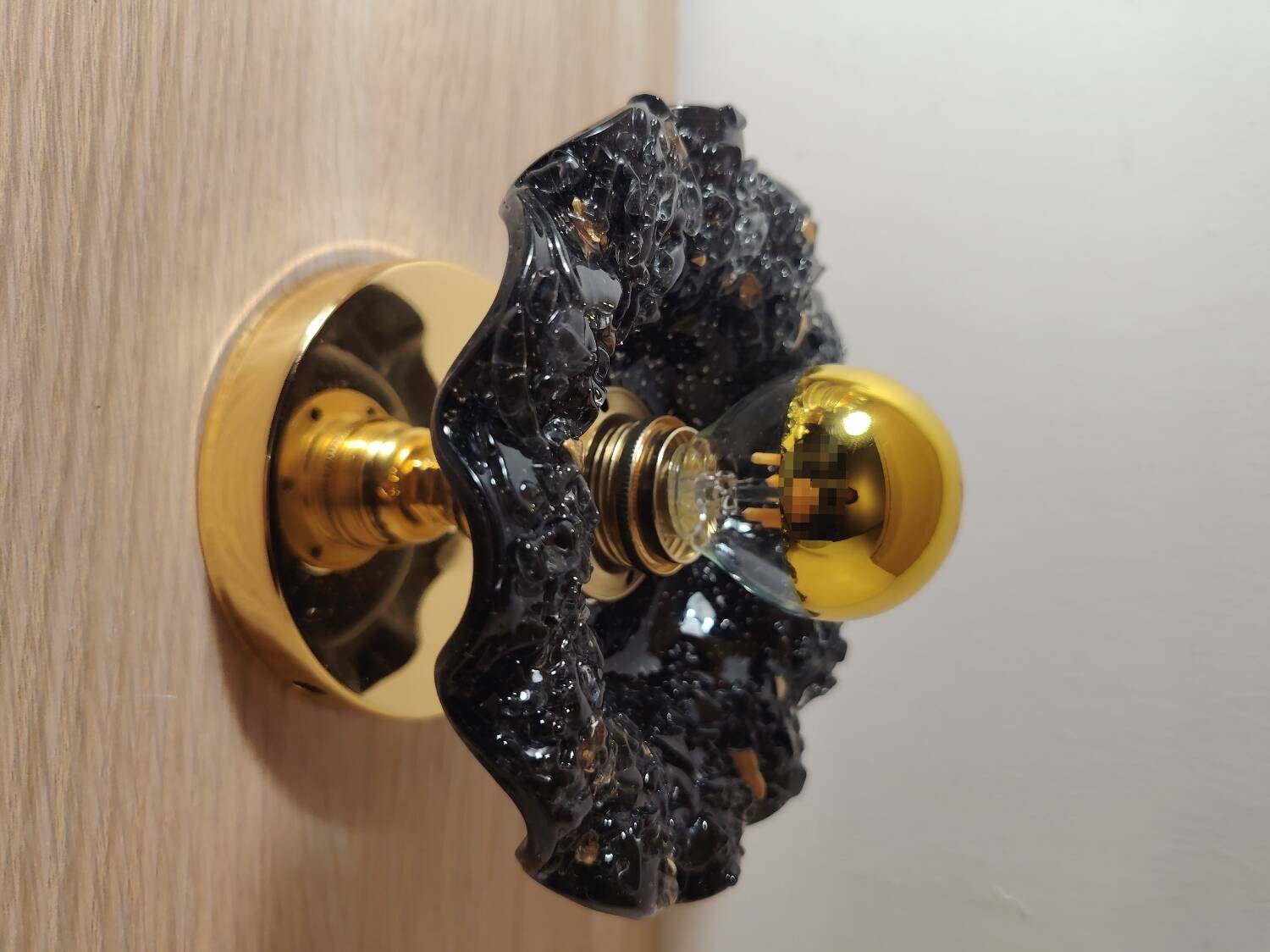 Black and gold Murano flower wall light