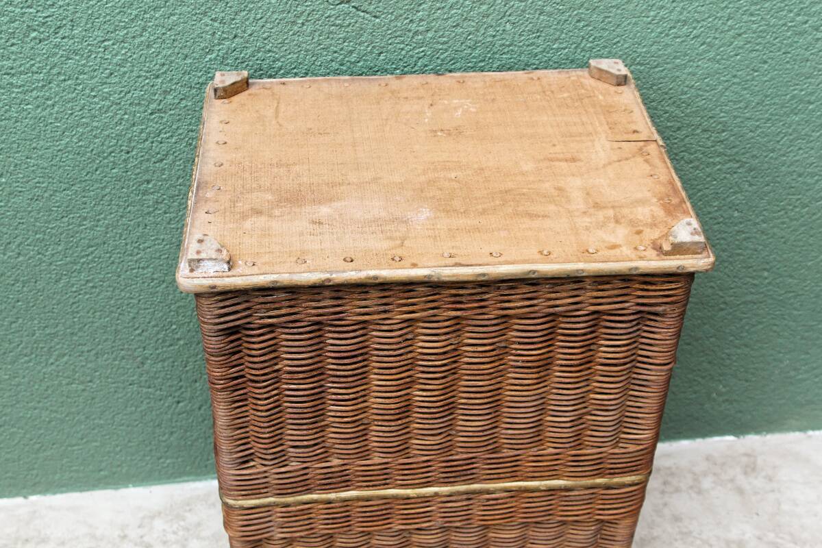 Woven wicker laundry basket