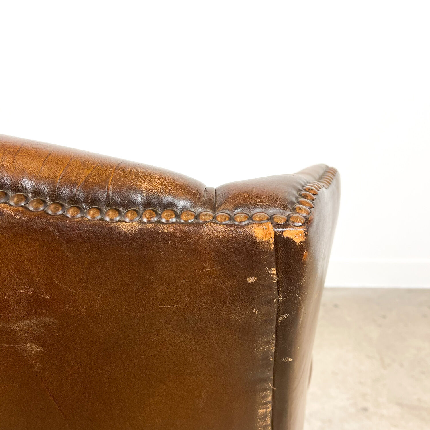Dark brown sheep leather wingback armchair vintage
