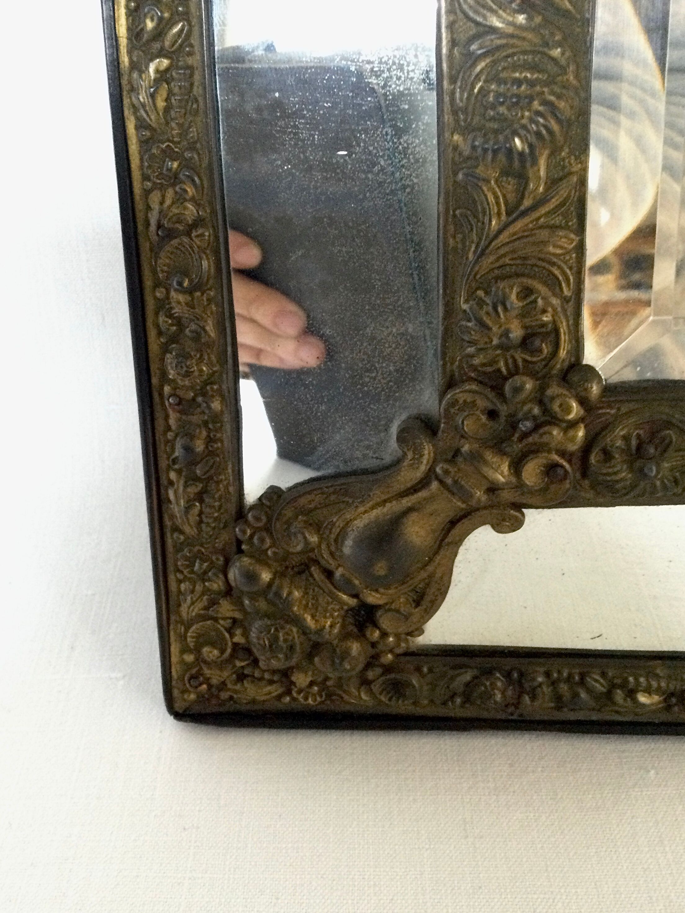 19th century embossed brass mirror with bead - 65x39cm