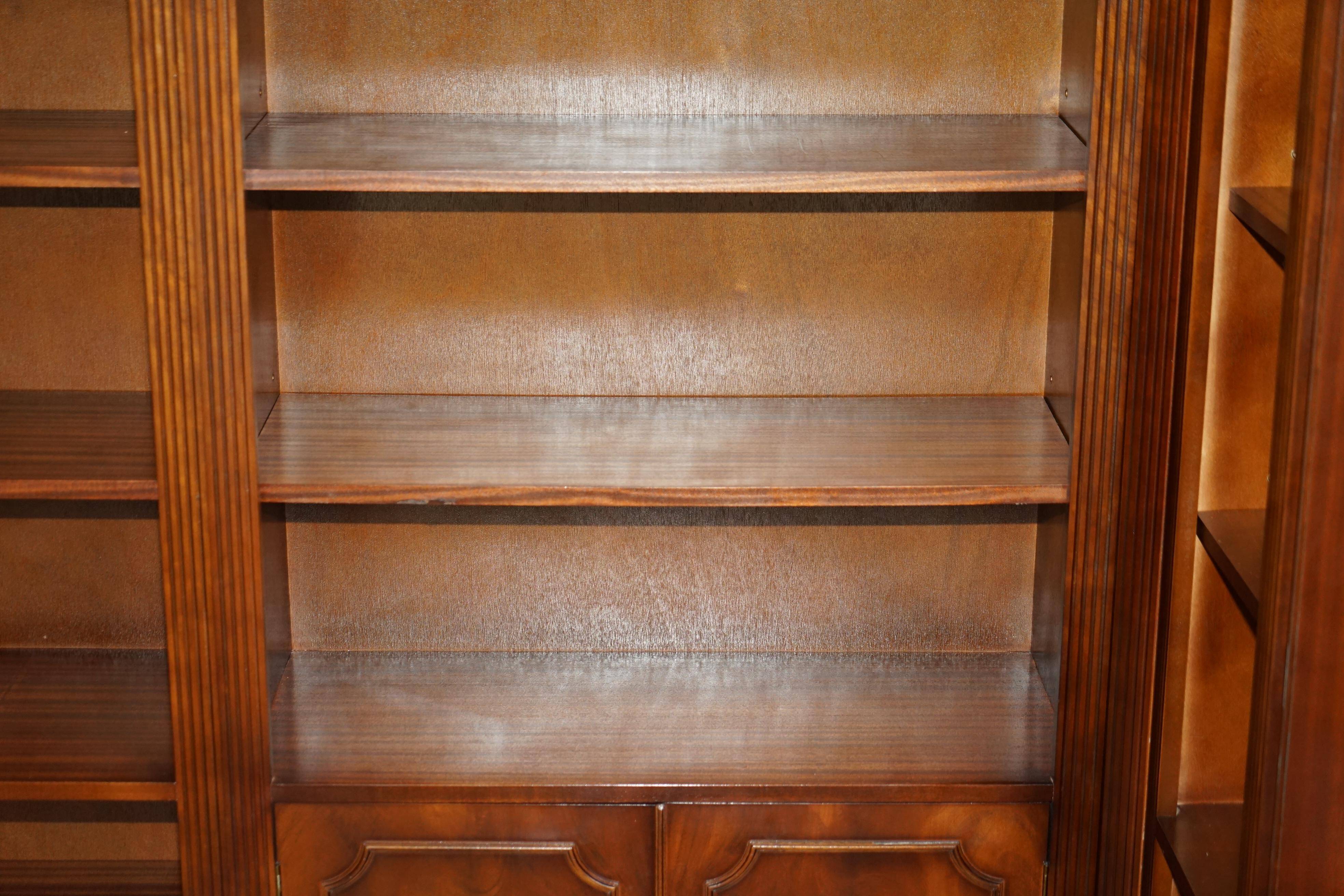 Corner library made of flamed hardwood, in 3 parts.