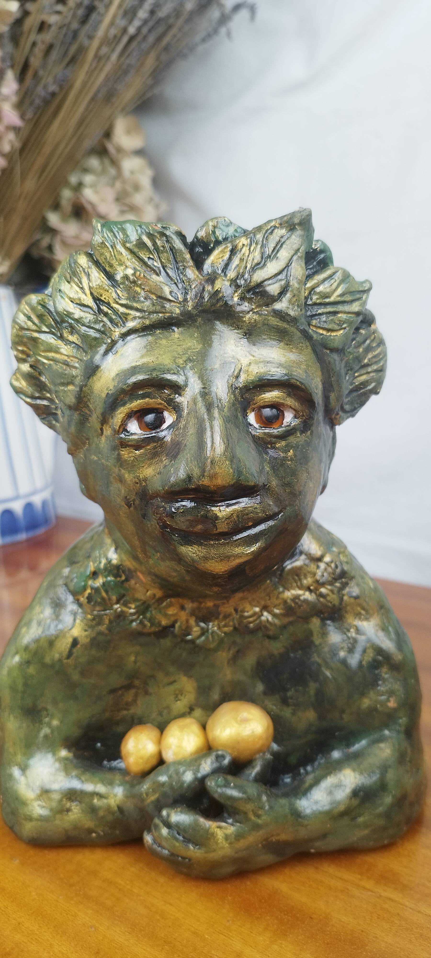 Clay sculpture of mother nature holding eggs, vintage modern figurative art