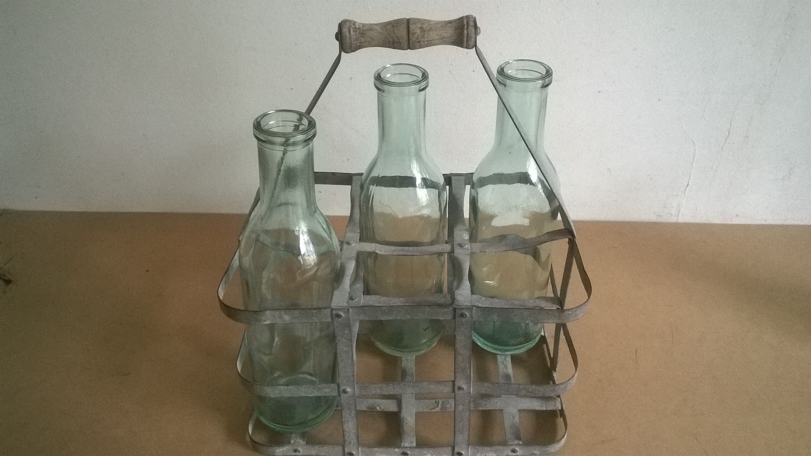 Old bottle rack in zinc