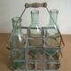 Old bottle rack in zinc