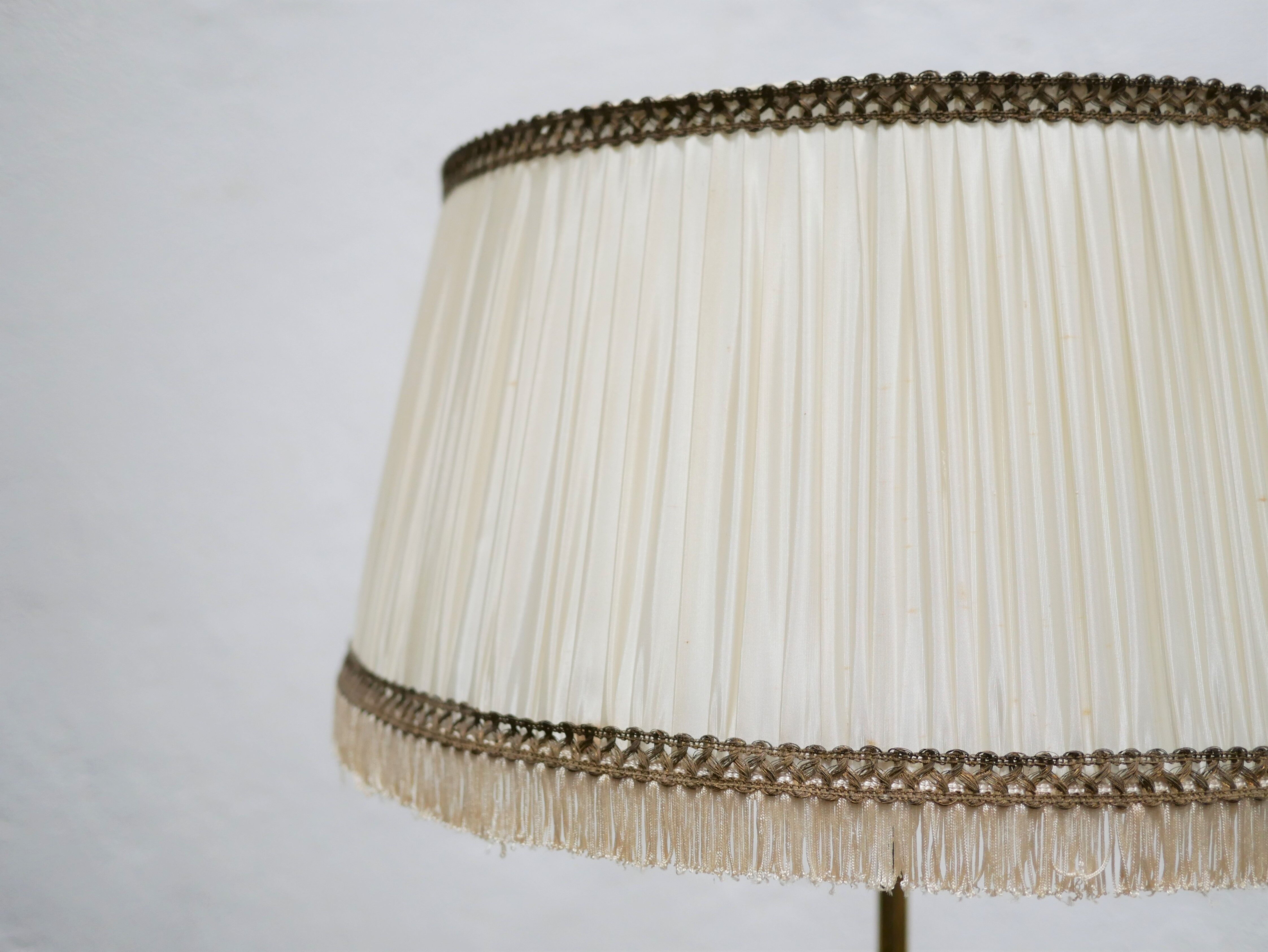 Vintage brass tripod floor lamp