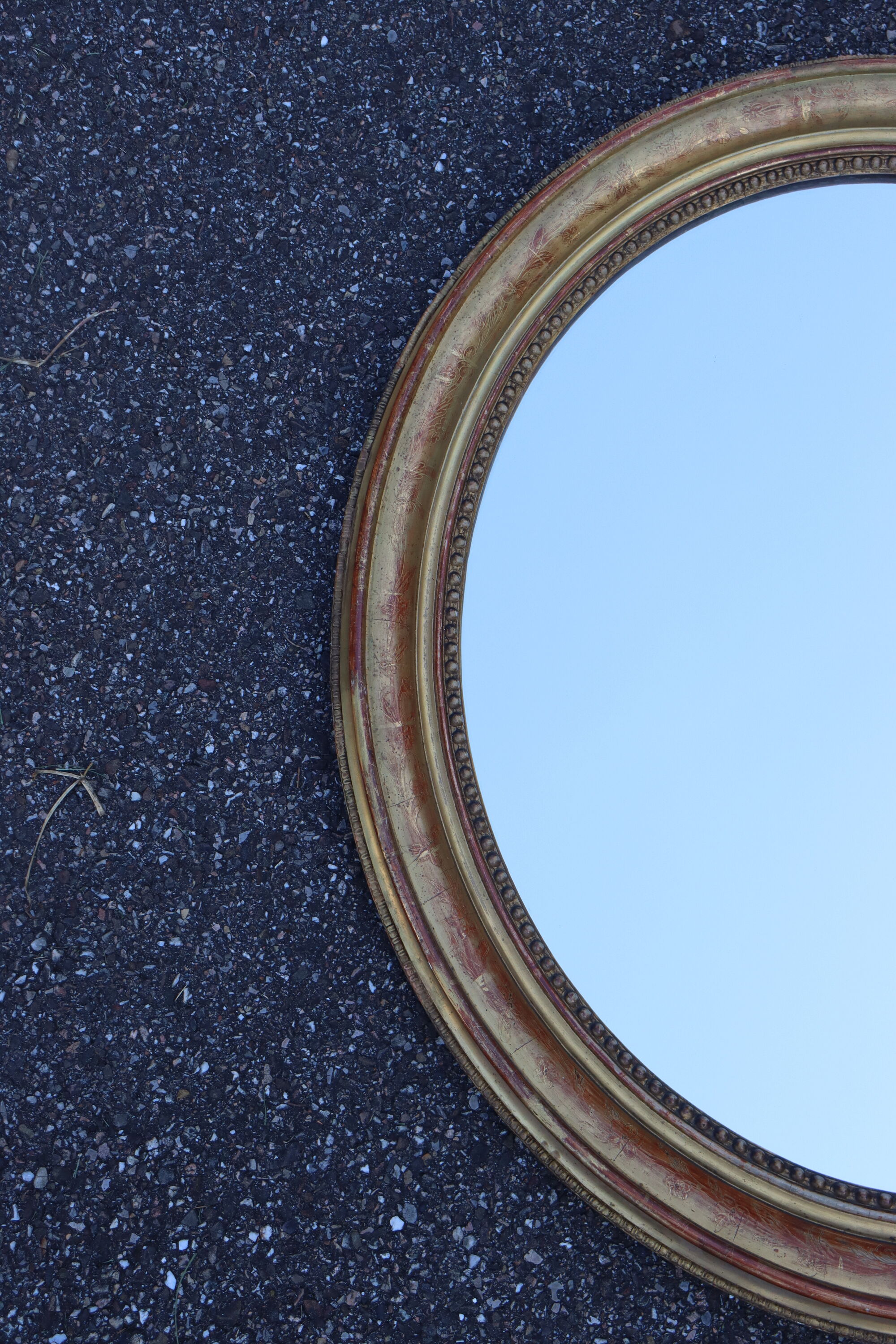Pair of oval mirrors from the Louis Philippe period in gilded wood.