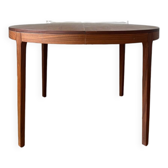 Round extendable rosewood table from the 70s