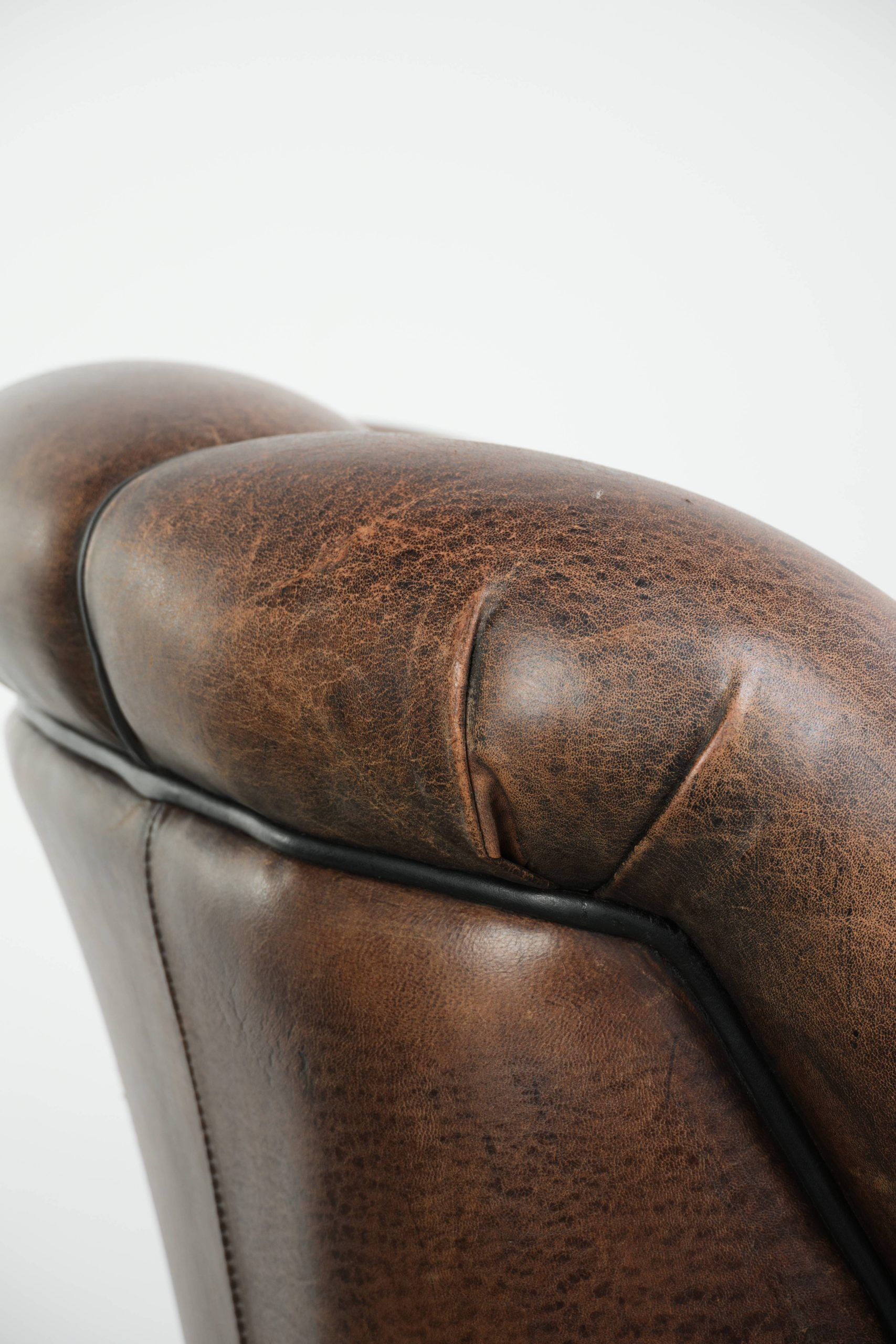 Vintage sheepskin armchair with a unique design and timeless appearance