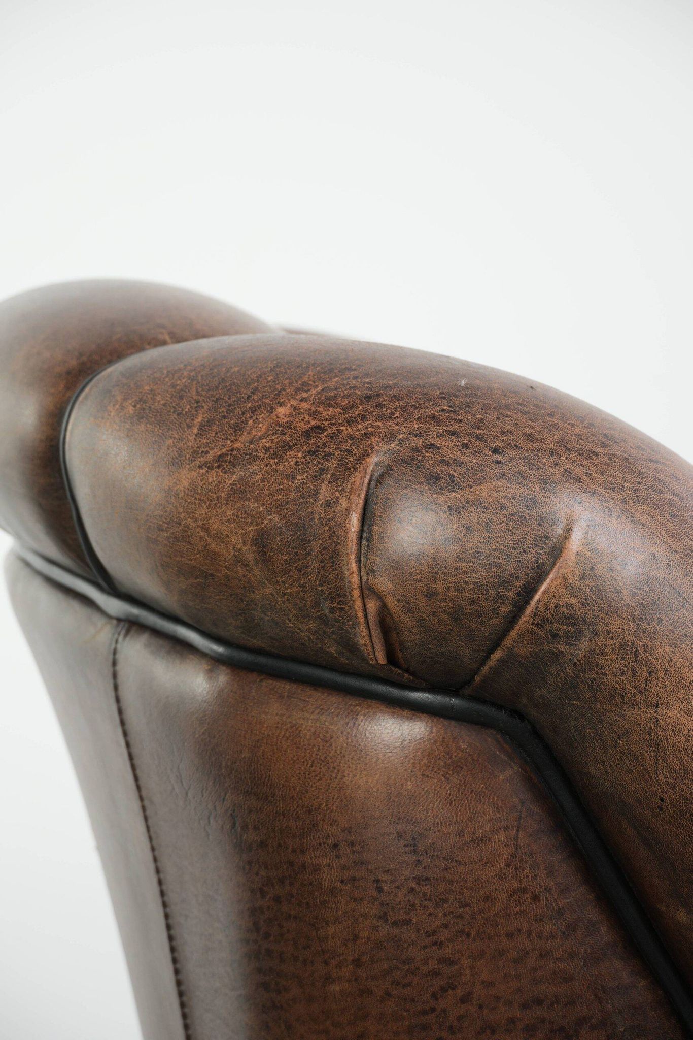 Vintage sheepskin armchair with a unique design and timeless appearance