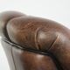 Vintage sheepskin armchair with a unique design and timeless appearance