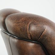 Vintage sheepskin armchair with a unique design and timeless appearance