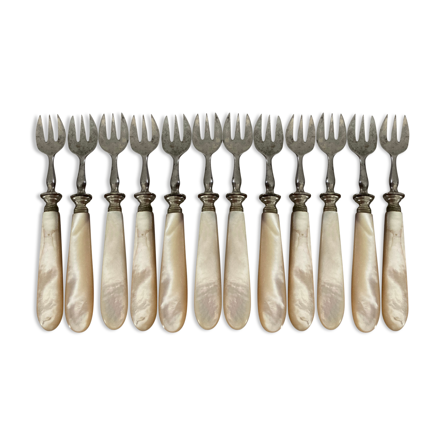 12 dessert forks in steel and mother-of-pearl